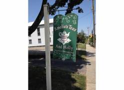 Amelia's Tea and Holly sign